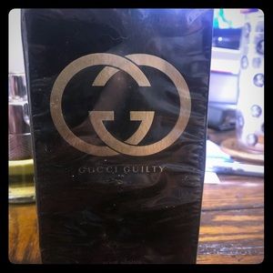 Sealed 5 oz bottle of Gucci Guilty. Brand new!